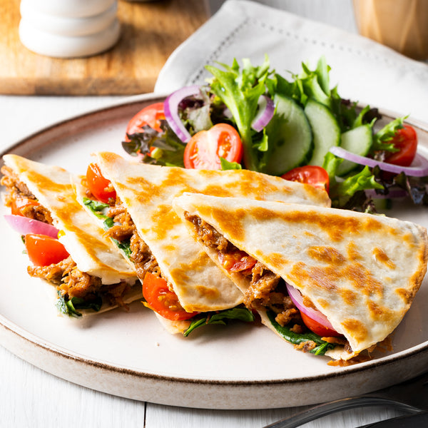 <p>Fable meaty mushrooms, cherry tomatoes, Spanish onion, baby spinach, mayo in a toasted tortilla, served with a side salad.<br/>2575 kJ</p>