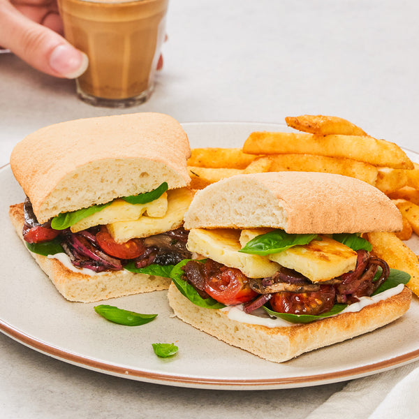 <p>Golden haloumi with fresh basil, mushrooms, spinach, tomato, red onion & aioli in a toasted ciabatta.<br/>4920kJ<br/></p>