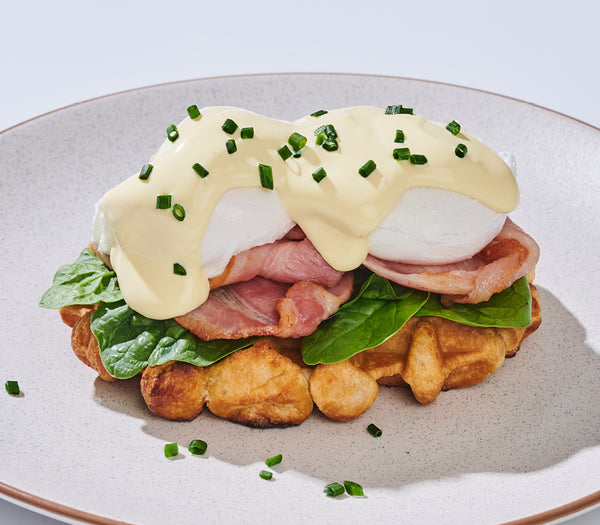 <p>The Bacon Benny you know and love with a twist!<br/>Served on a toasted Belgian waffle. <br/>4350kJ<br/></p>