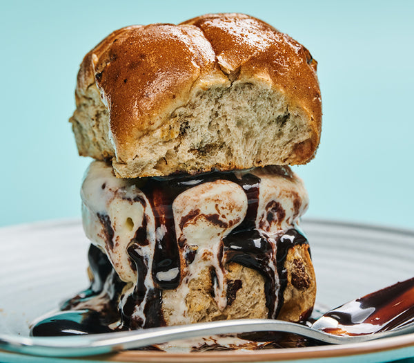 <p>We are levelling up your average treat with our Hot Cross Ice Cream Sandwich which boasts a toasted hot cross bun crowned with a generous ice cream scoop and finished with the topping of your choice.<br/>2446kJ<br/></p>