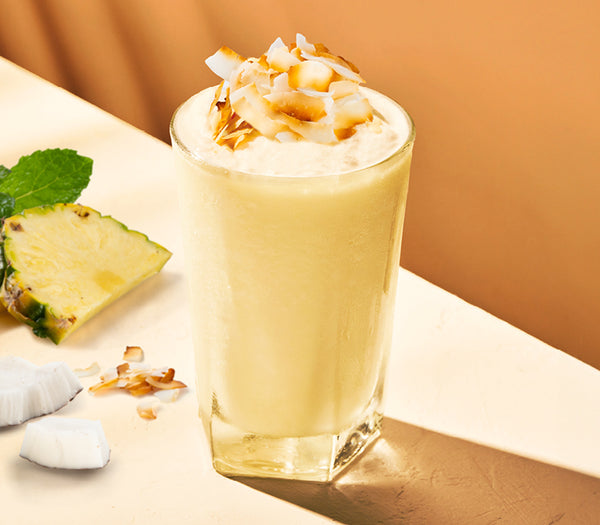 <p>Pineapple, coconut cream, and ice blended and topped with toasted coconut chips! <br/>1836kJ</p>
