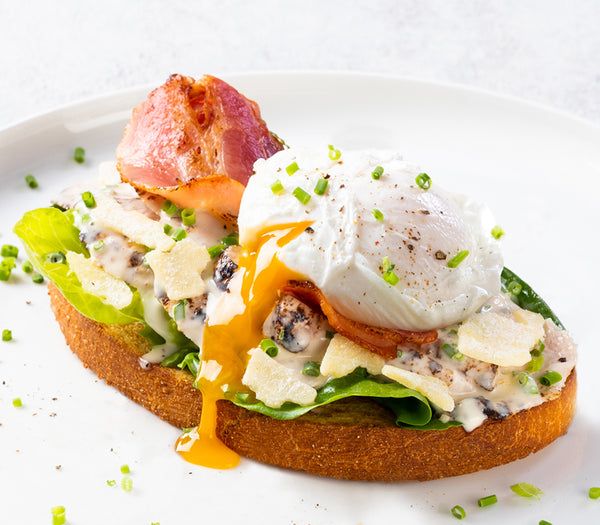 <p>Your favourite salad – on toast! Toasted sourdough loaded with cos lettuce, chicken, bacon, parmesan, poached egg, Caesar dressing and chives!<br/>2586kJ<br/></p>