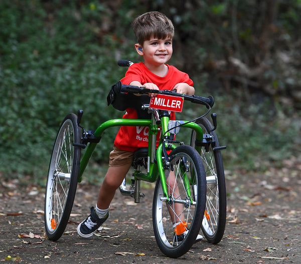 <p>Now three, Miller undergoes intensive therapy, often three hours a day for weeks at a time. The long-term goal is to improve his mobility, but it’s a long road ahead.</p><p>Miller loves any therapy that involves walking but the frame provided by the NDIS wasn’t designed for outdoor use. Outside, the wheels would seize and put him in danger of toppling on grass and uneven surfaces.</p><p>During physical therapy one day Miller tried using a Race Runner - a frame that can be used outdoors on a range of surfaces. The more Miller used it, the more progress he made in his gait and mobility. His parents were determined to buy him one.</p>
