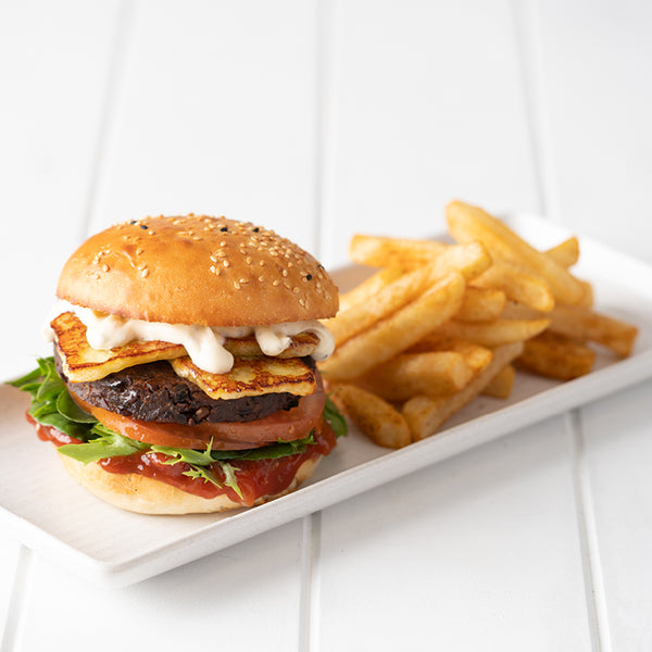 <p>Fable meaty mushroom plant-based patty, haloumi, tomato relish, lettuce, tomato, mayo, served with seasoned chips. <br/>5291 kJ<br/></p>